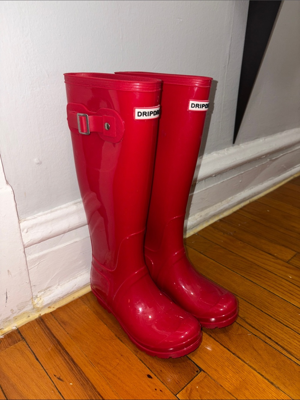 Knee high red rain boots